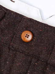 ウエストの調整可能なサイドタブと果実ボタンのディテール