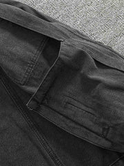 製品画像: スタンドカラーヴィンテージウォッシュデニムジャケット正面展示
詳細画像: 胸前のワークポケットとスタンドカラーデザインの詳細