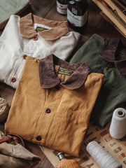 製品画像: ミシガン鉄道ワークジャケットの正面、展示されたウエスタン風とレトロなブロックカラーのデザイン
詳細画像: コーデュロイのブロックポケットと袖口のディテール、ウォッシュ加工とワーク要素を表現