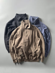 前ポケットとフラップカラーのジップディテール