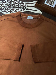 フリンジ付きのネックラインと袖口 ディテール画像