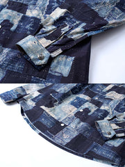 製品画像:
このパッチワーク風長袖シャツは、ネイビーとホワイトの色落ち風ブロック模様が特徴で、ヴィンテージ感溢れるデザイン。100%コットン素材を使用しており、カジュアルスタイルにも合わせやすいルーズフィットの一枚。
詳細画像:
パッチワーク風デザインのディテール画像。ネイビーとホワイトの植物染めを施した色落ち風ブロック模様が際立ち、シャツ全体に独自のヴィンテージ感を持たせている。