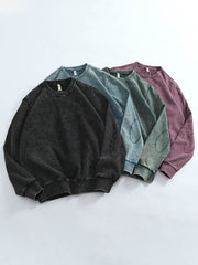 製品画像: ヴィンテージスノーウォッシュクルーネックスウェットのフロントビュー。4色展開で豊富なカラーバリエーションが魅力のデイリースウェット
詳細画像: リブ袖口とスノーウォッシュ加工のディテール。ヴィンテージ感を引き出すトレンドデザイン