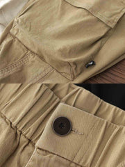 製品画像: ヴィンテージワーク パラシュートジョガーパンツ 正面、ウォッシュ加工とリブウエストデザイン
詳細画像: リブウエストと大きめポケットのディテール、微ストレッチツイル