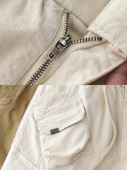 製品画像: ヴィンテージワーク パラシュートジョガーパンツ 正面、ウォッシュ加工とリブウエストデザイン
詳細画像: リブウエストと大きめポケットのディテール、微ストレッチツイル