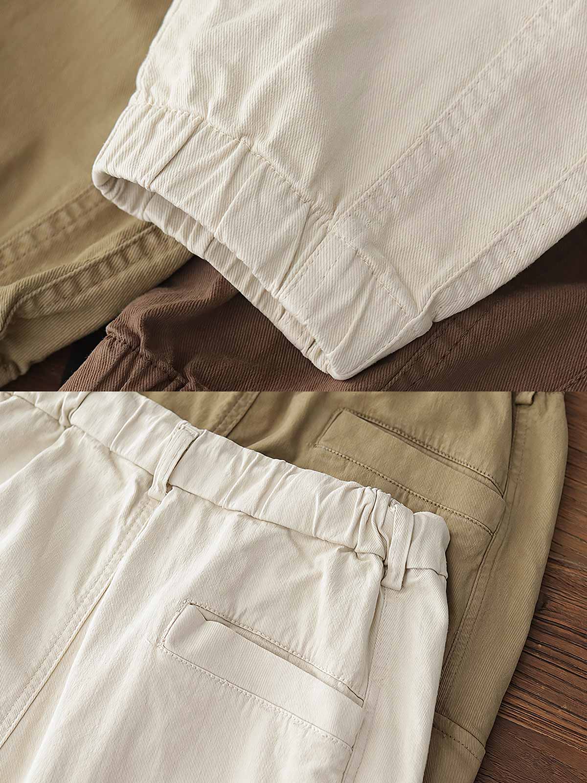 製品画像: ヴィンテージワーク パラシュートジョガーパンツ 正面、ウォッシュ加工とリブウエストデザイン
詳細画像: リブウエストと大きめポケットのディテール、微ストレッチツイル