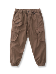 製品画像: ヴィンテージワーク パラシュートジョガーパンツ 正面、ウォッシュ加工とリブウエストデザイン
詳細画像: リブウエストと大きめポケットのディテール、微ストレッチツイル