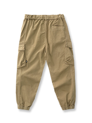 製品画像: ヴィンテージワーク パラシュートジョガーパンツ 正面、ウォッシュ加工とリブウエストデザイン
詳細画像: リブウエストと大きめポケットのディテール、微ストレッチツイル