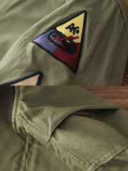 製品画像: 裏起毛 防寒 ミリタリー タンカージャケット 正面
詳細画像: TALONジッパーとトリコロール刺繍ワッペン ディテール