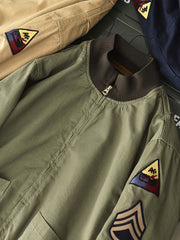 製品画像: 裏起毛 防寒 ミリタリー タンカージャケット 正面
詳細画像: TALONジッパーとトリコロール刺繍ワッペン ディテール