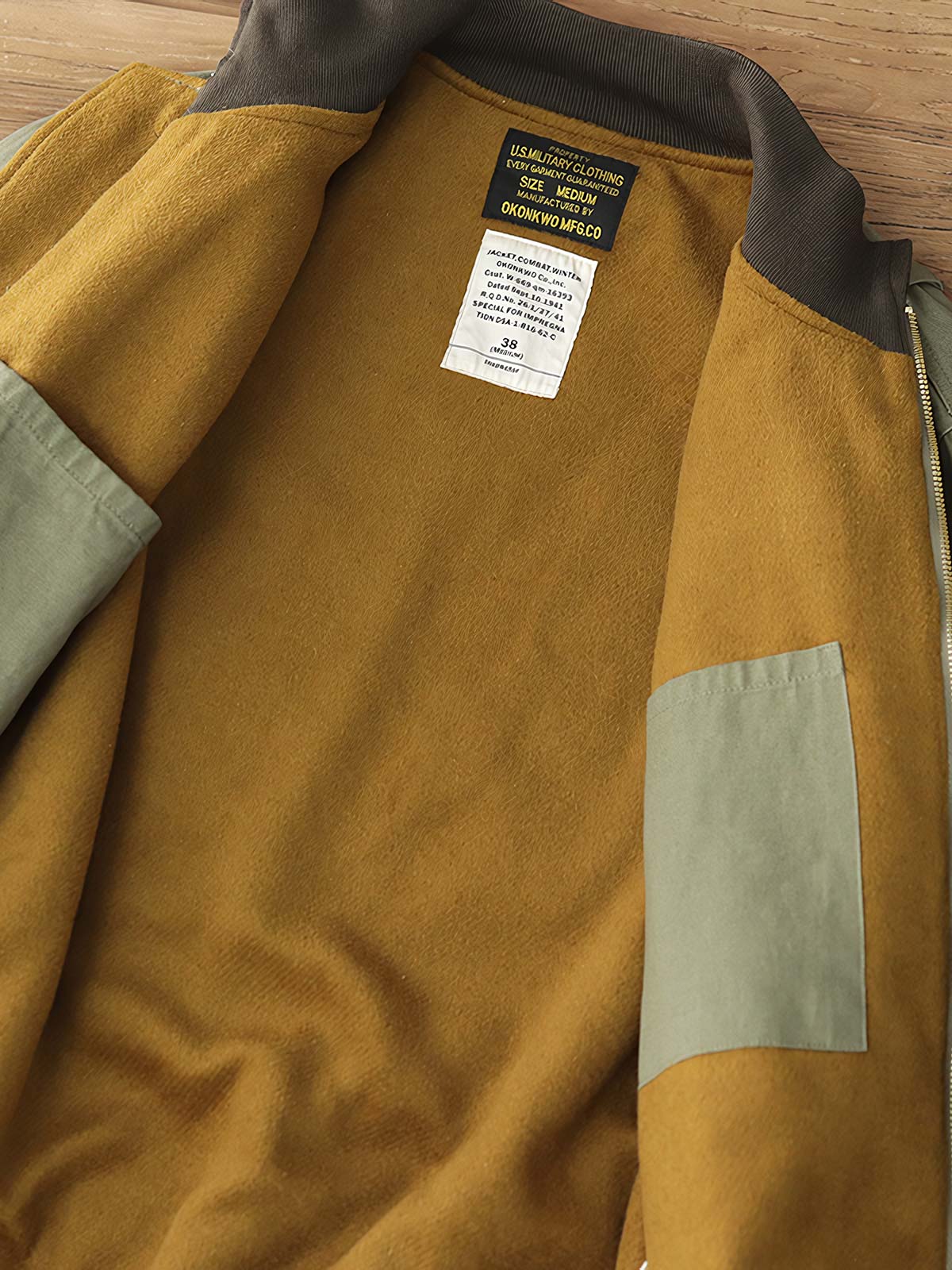 製品画像: 裏起毛 防寒 ミリタリー タンカージャケット 正面
詳細画像: TALONジッパーとトリコロール刺繍ワッペン ディテール