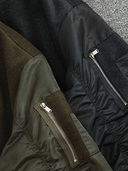 製品画像: ウール配色のレトロ風MA-1フライトジャケットのフロントビュー。パネルデザインとリブカラーが特徴のスタイリッシュなアウター
詳細画像: ウールとポリエステルのパネルデザインとジッパーのディテール。コントラスト配色が映えるレトロ風フライトジャケット