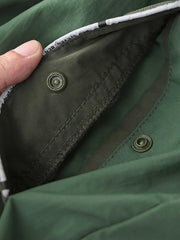 製品画像: レトロ風 配色 フード付き トレーニングジャケット 正面
詳細画像: ハーフジップと反射テープのディテール