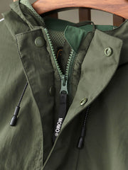 製品画像: レトロ風 配色 フード付き トレーニングジャケット 正面
詳細画像: ハーフジップと反射テープのディテール