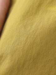 製品画像: 軽量 Cordura ナイロン 速乾トップ 正面、耐摩耗性・リップストップ機能
詳細画像: 両サイドの大容量ポケットと伸縮性のある袖口のディテール、オーバーサイズシルエット