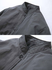 製品画像: リバーシブル厚手コーラルフリースヴィンテージワークコート全体表示。コットン表地とコーラルフリース裏地の組み合わせで、保温性とスタイルを両立したデザイン。
詳細画像: スタンドカラーとフリース裏地のディテール表示。すっきりとしたシルエットと柔らかいフリース素材が特徴。