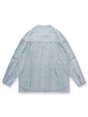 製品画像: ウォッシュ刺し子ストライプスタンドカラーデニムシャツ全体表示。東洋風デザインとモダンな刺し子刺繍が特徴のカジュアルシャツ。
詳細画像: ストライプ状の刺し子刺繍ディテール表示。民族風と幾何学模様が融合したデザインで、シャツのアクセントに。