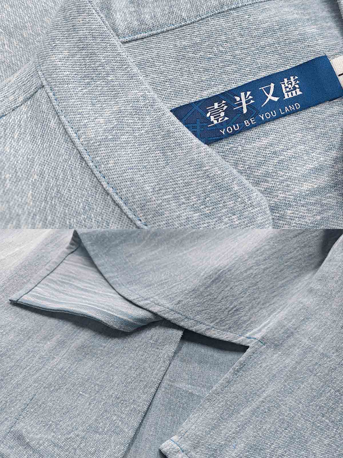 製品画像: ウォッシュ刺し子ストライプスタンドカラーデニムシャツ全体表示。東洋風デザインとモダンな刺し子刺繍が特徴のカジュアルシャツ。
詳細画像: ストライプ状の刺し子刺繍ディテール表示。民族風と幾何学模様が融合したデザインで、シャツのアクセントに。