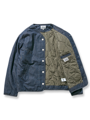 製品画像: ヴィンテージ風デニム中綿ワークジャケット全体展示。秋冬に適した保温性とスタイルが特徴のアイテム。
詳細画像: 中綿裏地と隠しスナップボタンのディテール展示。ヴィンテージ感のあるディテールがポイント。