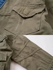 製品画像:
マルチ素材パッチワークデニムジャケットの全体画像。ミリタリーグリーンとデニム素材のパッチワークが特徴的で、ウォッシュ加工によりヴィンテージ感とトレンド感を兼ね備えています。
詳細画像:
ジャケットのパッチワークデザイン、ウォッシュ加工によるユーズド感、ディテールにこだわったボタンとジッパー部分。