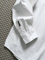 製品画像: 春秋シーズンに最適なコーマコットン製格子織り長袖シャツ全体画像|リラックスフィットで快適なカジュアルスタイル
詳細画像: コーマコットン素材の格子織りディテール|春秋のカジュアルコーディネートに最適な品質感