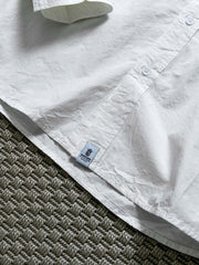 製品画像: 春秋シーズンに最適なコーマコットン製格子織り長袖シャツ全体画像|リラックスフィットで快適なカジュアルスタイル
詳細画像: コーマコットン素材の格子織りディテール|春秋のカジュアルコーディネートに最適な品質感