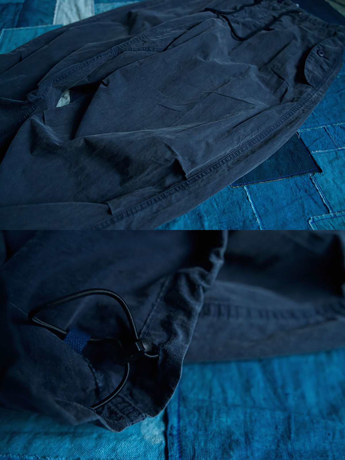 製品画像
ストレートシルエットのパラシュートパンツ全体展示。ウォッシュ加工されたネイビーカラーが特徴的で、リラックス感とヴィンテージ感を演出。快適な履き心地とスタイリッシュなデザインが調和したアイテム。
詳細画像
裾調整機能とウォッシュ加工ディテール。耐久性に優れたコットンとナイロン混紡素材を使用し、通気性と耐摩耗性を提供。裾の調整機能で、自分にぴったりなフィット感を実現。