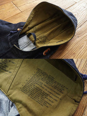 製品画像: デニムバージョンのM51フィッシュテールコート全体イメージ画像。特注のデニム素材で再現されたヴィンテージミリタリースタイルが特徴的。シルバーカラージッパーやブルー樹脂ボタンなど、細部までこだわったデザインが魅力。
詳細画像: YKK製スナップボタンと特注シルバーカラージッパー、ブルー樹脂ボタンのディテールをクローズアップした画像。ヴィンテージ感を引き立てる丁寧なディテールが際立つ。