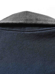 製品画像: 3WAYヴィンテージ切り替えデザインダウンワークジャケット全体イメージ画像。ブラウンコーデュロイ襟とネイビー×ミントグリーンの配色が特徴で、取り外し可能なインナーダウンを備えた多機能アウター。
詳細画像: ホワイトダックダウンライナーの取り外し構造とブラウンコーデュロイ襟、さらに水洗い加工が施された耐久性の高いコットン表地のディテールクローズアップ画像。保温性とクラシックなヴィンテージ感が際立つ仕上がり。