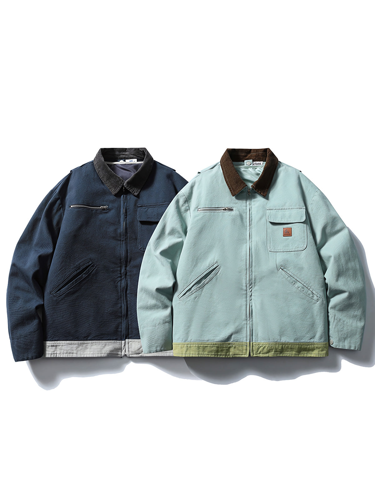 製品画像: 3WAYヴィンテージ切り替えデザインダウンワークジャケット全体イメージ画像。ブラウンコーデュロイ襟とネイビー×ミントグリーンの配色が特徴で、取り外し可能なインナーダウンを備えた多機能アウター。
詳細画像: ホワイトダックダウンライナーの取り外し構造とブラウンコーデュロイ襟、さらに水洗い加工が施された耐久性の高いコットン表地のディテールクローズアップ画像。保温性とクラシックなヴィンテージ感が際立つ仕上がり。