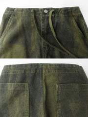 製品画像:
"重厚な厚手のヒョウ柄カモフラージュパラシュートカーゴパンツの全体図。ヴィンテージ感と耐久性を引き立てる水洗い加工とヒョウ柄カモフラージュプリントが特徴的なデザイン"
詳細画像:
"パラシュートパンツのダブルプリーツと6ポケットデザインのクローズアップ。機能性を重視したディテールと、ヴィンテージ風の風合いが際立つ素材感"