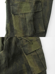 製品画像:
"重厚な厚手のヒョウ柄カモフラージュパラシュートカーゴパンツの全体図。ヴィンテージ感と耐久性を引き立てる水洗い加工とヒョウ柄カモフラージュプリントが特徴的なデザイン"
詳細画像:
"パラシュートパンツのダブルプリーツと6ポケットデザインのクローズアップ。機能性を重視したディテールと、ヴィンテージ風の風合いが際立つ素材感"