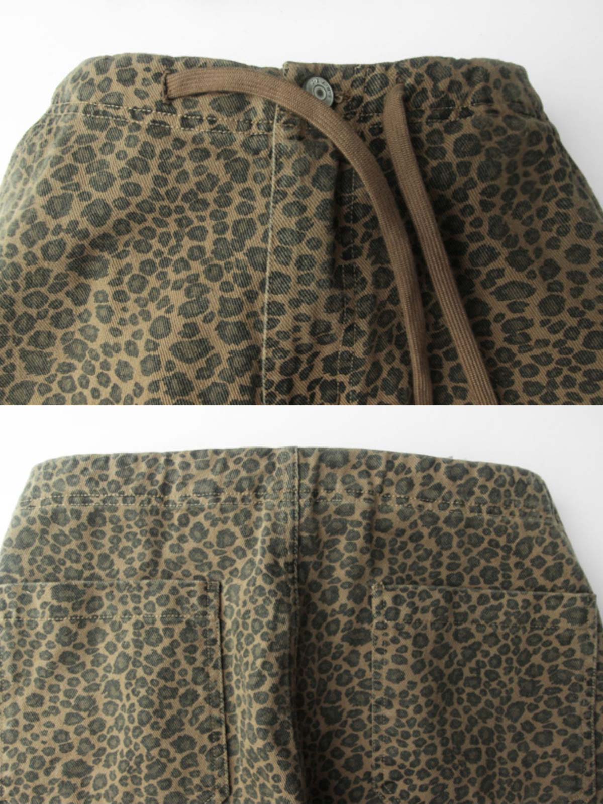 製品画像:
"重厚な厚手のヒョウ柄カモフラージュパラシュートカーゴパンツの全体図。ヴィンテージ感と耐久性を引き立てる水洗い加工とヒョウ柄カモフラージュプリントが特徴的なデザイン"
詳細画像:
"パラシュートパンツのダブルプリーツと6ポケットデザインのクローズアップ。機能性を重視したディテールと、ヴィンテージ風の風合いが際立つ素材感"