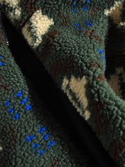 製品画像:
リバーシブルフェイクシアリング中綿ジャケット、アウトドア素材と民族風フェイクシアリングデザインを融合、秋冬の実用的で暖かいアイテム
詳細画像:
民族風フェイクシアリング素材と高密度アウトドア素材のディテールクローズアップ、防風性とデザイン性を兼ね備えたリバーシブルジャケット