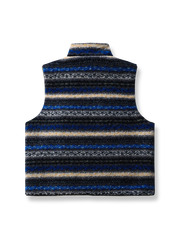 製品画像: リバーシブルデザインのラムファーワークベスト正面展示画像、民族風スタイルで暖かさと快適さを提供するユニセックスアイテム。
詳細画像: ベストの内側に施されたラムファーのディテールアップ、リバーシブルデザインによるコーディネートの幅が広がる特徴。