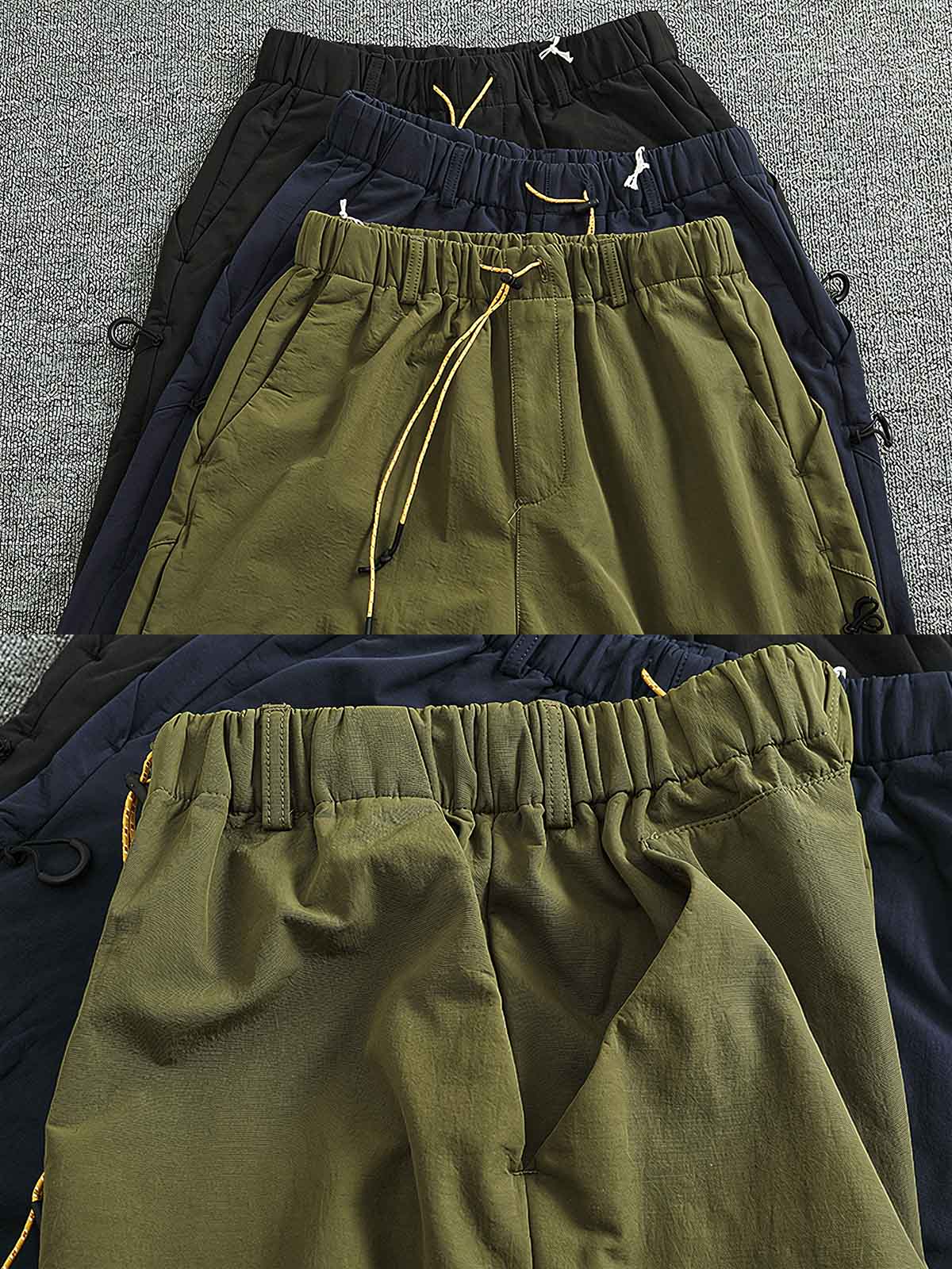 製品画像: 複合素材の加厚デザインが特徴の機能性ワークパンツ正面展示画像、アウトドアと日常使いに最適なアイテム。
詳細画像: ワークパンツのディテールアップ、スポーツジップポケットと膝部の3D立体カットによる最適なフィット感。