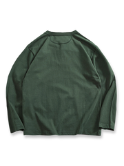 製品画像
「ヘンリーネック 長袖Tシャツ。高密度コットン素材とアメカジ風ウォッシュ加工が特徴で、ヴィンテージ感と耐久性を兼ね備えたシンプルなデザイン」
詳細画像
「ヘンリーネックの金属ボタンとアメカジ風ウォッシュ加工による自然なレトロ感。高密度コットンの厚手生地で、クラシックなディテールが際立つ一枚」