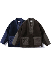 製品画像: Vネックデザインとフリースパッチワークを組み合わせた、ヴィンテージとモダンが融合した中綿ジャケット。抜群の保温性を提供。
詳細画像: はんてん風のデザインが特徴的で、ゆったりとしたシルエット。大容量ポケットとフリース素材で機能性も重視。