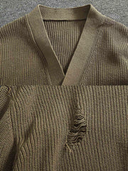 製品画像
「Vネックカーディガンセーター、ダメージ加工でヴィンテージ感を演出、厚手の柔らかなコットン素材が快適な着心地を提供」
詳細画像
「Vネックデザインがシンプルで上品、ダメージ加工による独自の風合い、前面の2つのポケットがデザインと実用性を両立」