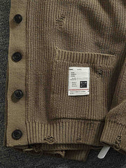 製品画像
「Vネックカーディガンセーター、ダメージ加工でヴィンテージ感を演出、厚手の柔らかなコットン素材が快適な着心地を提供」
詳細画像
「Vネックデザインがシンプルで上品、ダメージ加工による独自の風合い、前面の2つのポケットがデザインと実用性を両立」