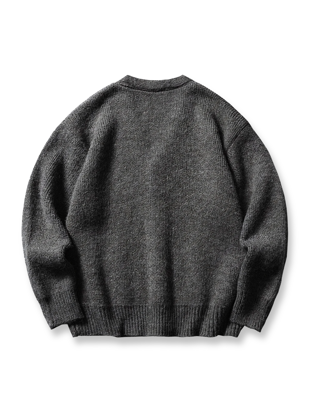 製品画像: ウール混紡 カラーブロック Vネック ニットカーディガンの全体展示画像。カラーブロックデザインがアクセントとなり、フロントポケットやリブ仕上げのディテールが際立つスタイリッシュな一着。軽量で暖かく、日常使いからフォーマルシーンまで対応可能。
詳細画像: フロントポケットとカラーブロック部分の編み目ディテールをクローズアップした画像。繊細な光沢と柔らかな触感を実現したウール混紡素材の質感を強調。リブ仕上げによるフィット感と保温性も確認可能。