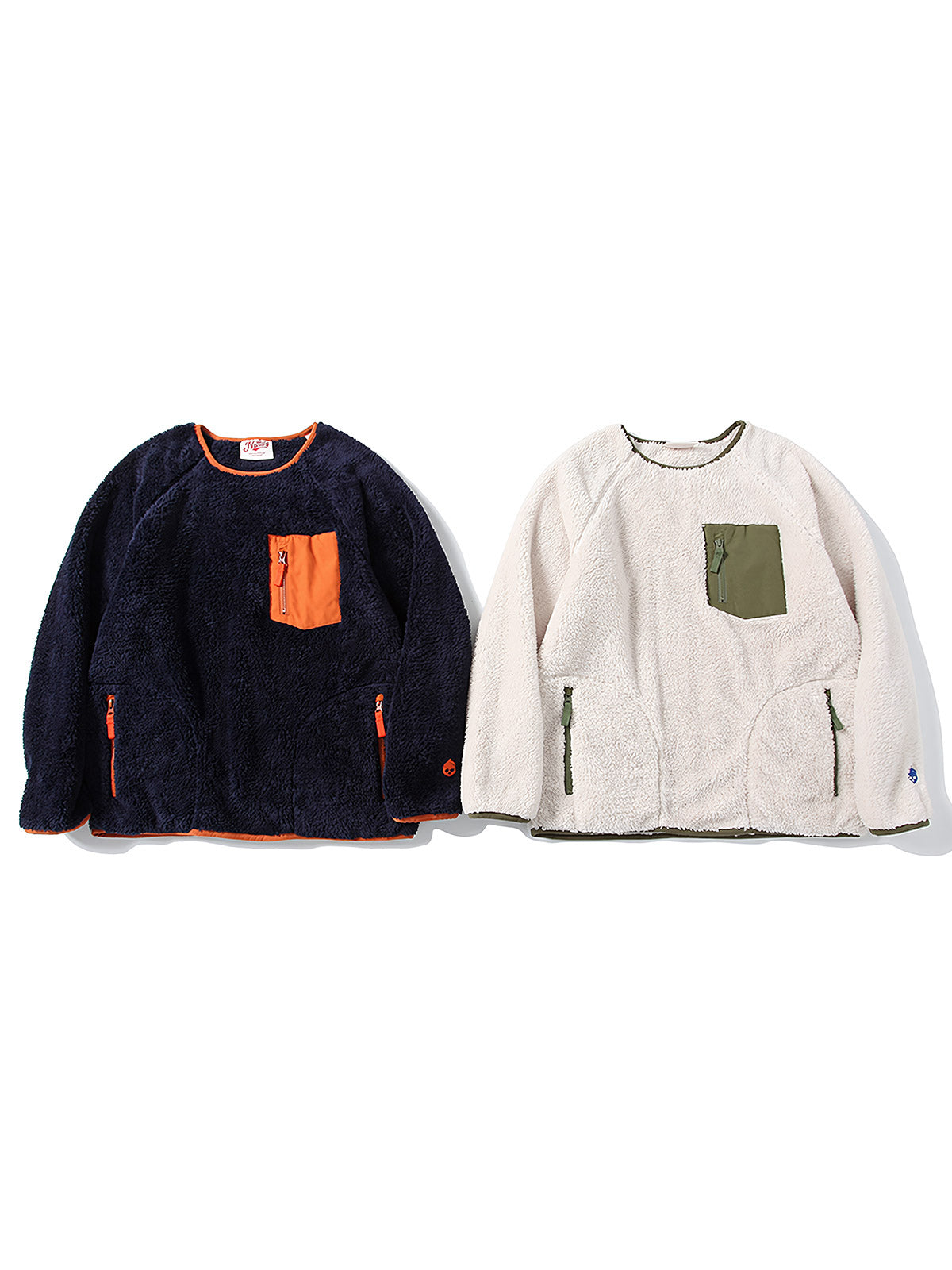 製品画像
「バイカラー コーラルフリース パッチワーク スウェット全体像。柔らかいコーラルフリース素材とバイカラーデザインが特徴の秋冬向けアイテム」
詳細画像
「バイカラー コーラルフリース パッチワーク スウェットの刺繍入りポケットとYKKカスタムジッパーのディテールクローズアップ。パッチワークの立体感が際立つ」