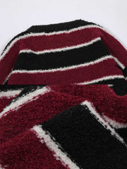 製品画像
「ヴィンテージ感漂うダメージディテールとカラフルなストライプ柄が特徴のストライプ クルーネック ニットセーター。ゆったりとしたシルエットで秋冬のカジュアルスタイルに最適な万能セーターの全体展示図」
詳細画像
「柔らかな混紡糸素材で作られたストライプ クルーネック ニットセーター。カラフルなストライプ柄とヴィンテージ風のダメージディテールが施されたトレンド感のあるディテールクローズアップ」