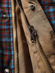 製品画像
「イギリス風チェック柄とシンプルな無地のリバーシブルデザインを特徴とする中綿ジャケット。100%コットン素材を使用し、軽量で暖かい秋冬用万能アウターの正面全体図」
詳細画像
「クラシックなイギリス風チェック柄とシンプルな無地デザインを両立したリバーシブル仕様のディテールクローズアップ。キルティング加工と袖口のゴム仕様が保温性と快適性を強化」