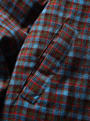 製品画像
「イギリス風チェック柄とシンプルな無地のリバーシブルデザインを特徴とする中綿ジャケット。100%コットン素材を使用し、軽量で暖かい秋冬用万能アウターの正面全体図」
詳細画像
「クラシックなイギリス風チェック柄とシンプルな無地デザインを両立したリバーシブル仕様のディテールクローズアップ。キルティング加工と袖口のゴム仕様が保温性と快適性を強化」