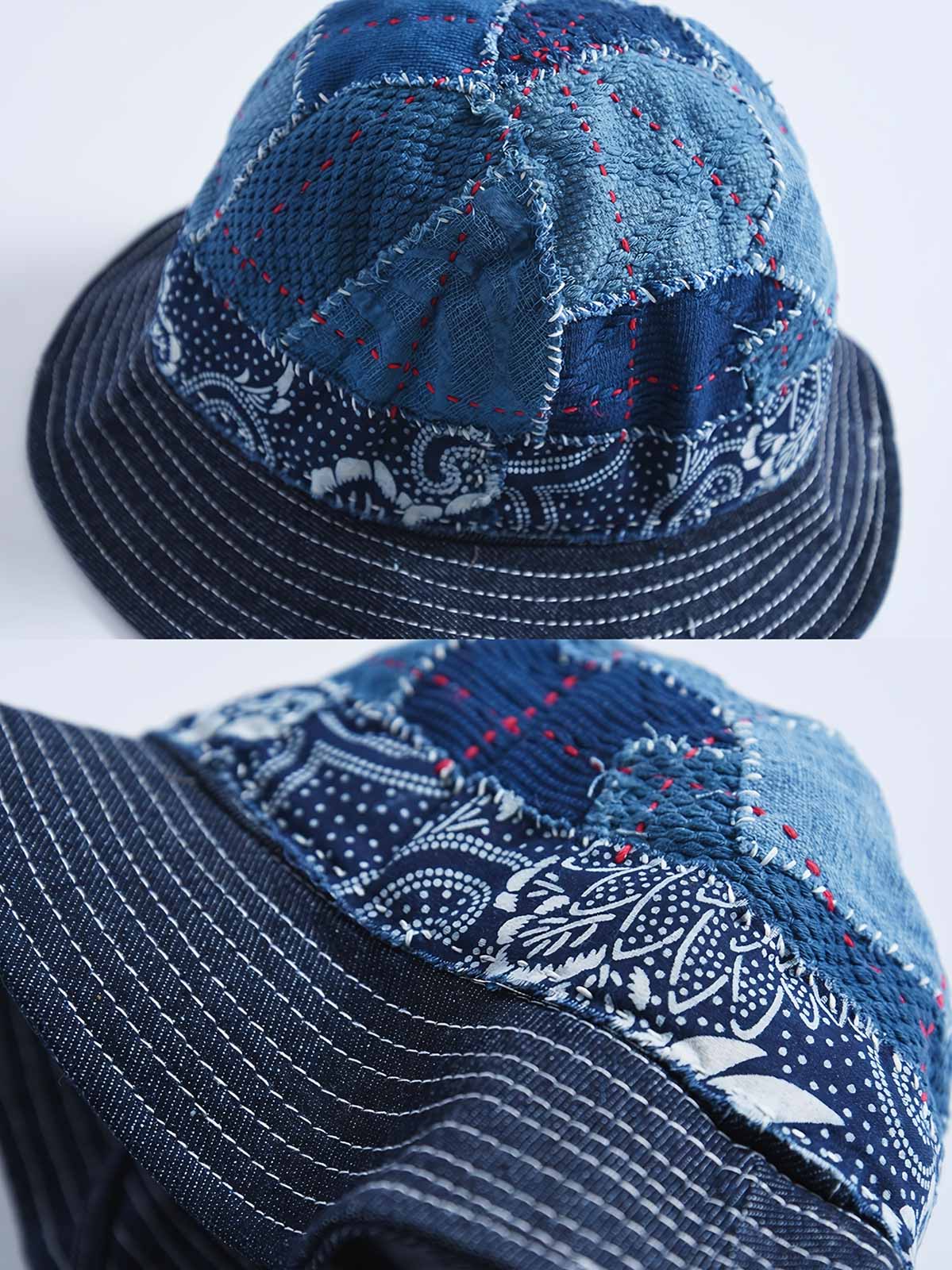 製品画像: ハンドメイド 古布パッチワーク 藍染め 剣道着生地 バケットハット。藍染めと剣道着生地を組み合わせた一点物のバケットハットの全体展示図。
詳細画像: 丁寧なパッチワークディテールと、剣道着生地の風合いを引き立てる細かなステッチのクローズアップ。