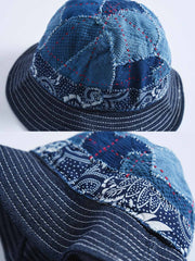 製品画像: ハンドメイド 古布パッチワーク 藍染め 剣道着生地 バケットハット。藍染めと剣道着生地を組み合わせた一点物のバケットハットの全体展示図。
詳細画像: 丁寧なパッチワークディテールと、剣道着生地の風合いを引き立てる細かなステッチのクローズアップ。