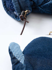 製品画像
「デコンストラクション(再構造)デザインとストーンウォッシュ加工を施したデニム生地が特徴のシープスキン裏地グローブ全体展示図。冬の保温性とカジュアルなデザイン性を兼ね備えた一品。」
詳細画像
「スマイル刺繍とデコンストラクション(再構造)を取り入れたパッチワークデザインのディテール特写。ストーンウォッシュ加工が施されたデニム生地とシープスキン風裏地の組み合わせが際立つ。」