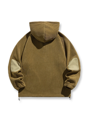 製品画像: レトロなバイカラー仕様とフード付きの裏起毛スウェット全体像、保温性とデザイン性を兼ね備えた秋冬向けカジュアルウェア。
詳細画像: バイカラーのドローストリングディテールと、暖かい裏起毛フリース素材のクローズアップ。