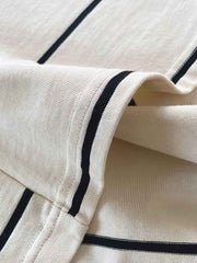 製品画像
ヴィンテージ感あふれるストライプパターンが特徴のヘビーウェイト長袖Tシャツ。胸元に高密度刺繍で描かれた動物たちが自然の童話を語るようなデザインで、青春の記憶とクラシックなエレガンスを融合した一枚
詳細画像
森の動物たちをモチーフにした高密度刺繍のディテールと、320gのヘビーウェイトコットンが織りなすヴィンテージ感ある質感が魅力。刺繍の精巧さと厚手の生地が時代を超えた価値を表現